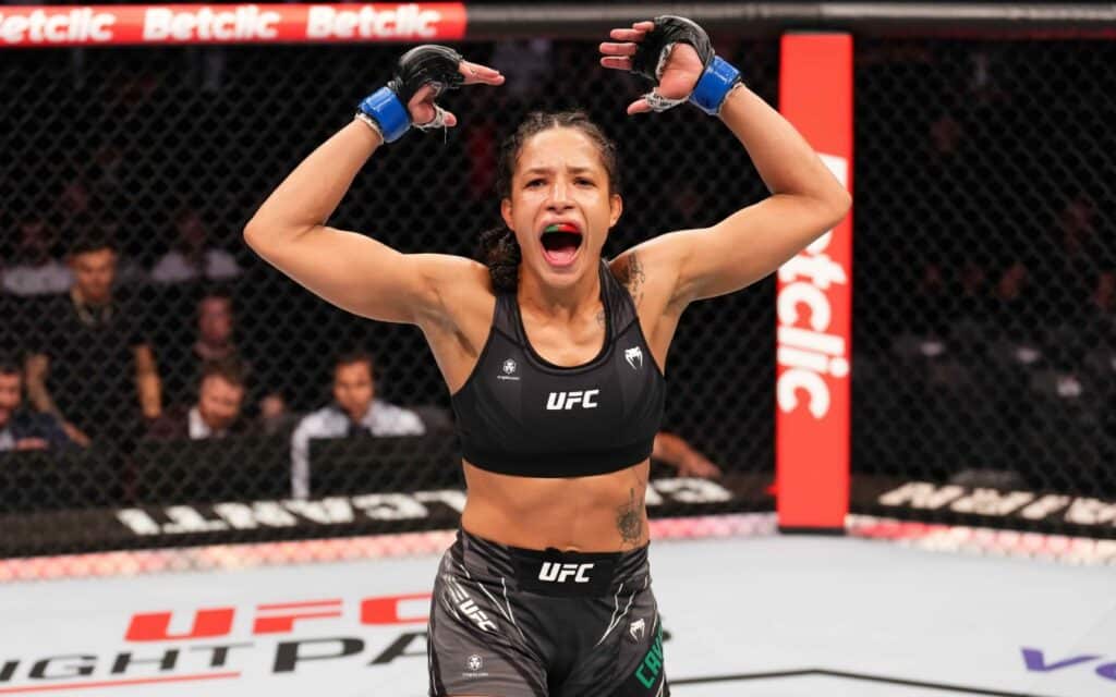 Jacqueline Cavalcanti faces unbeaten Montague at UFC Qatar 1 Jacqueline Cavalcanti celebrates a UFC win in the octagon with her arms raised