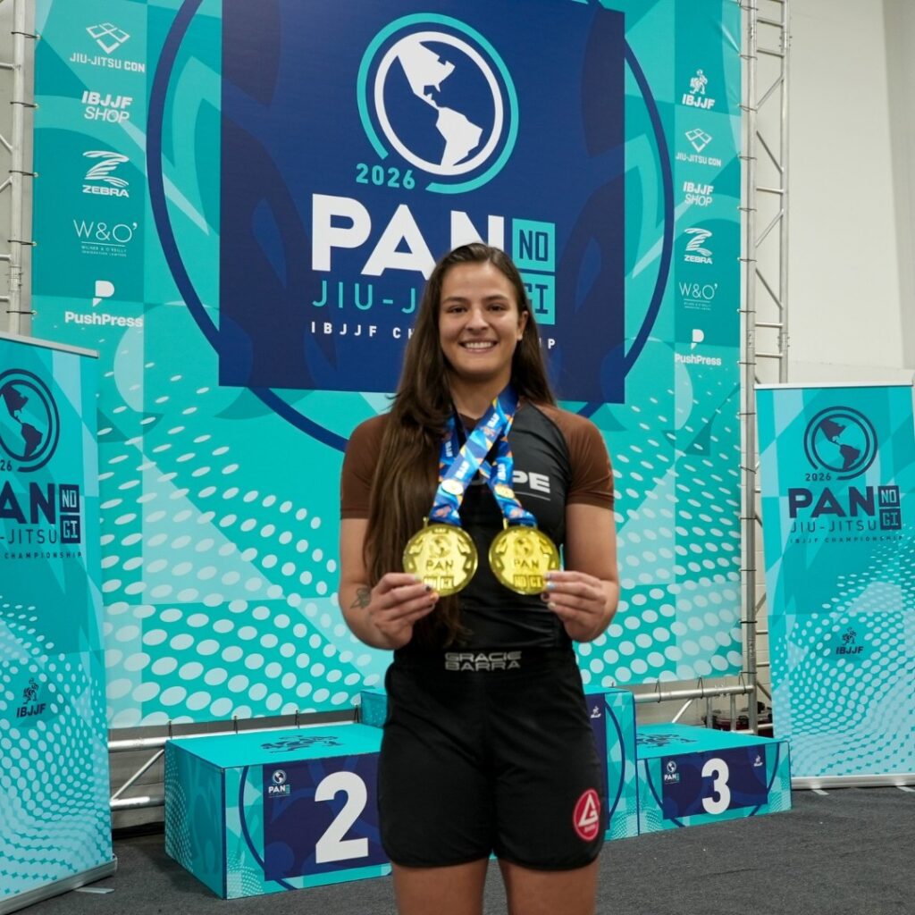 Lauriane Stavacz is in no hurry for the black belt: “I don’t want to bite off more than I can chew” 1 Lauriane Stavacz holds her two gold medals on the podium at the 2026 IBJJF Pan No-Gi
