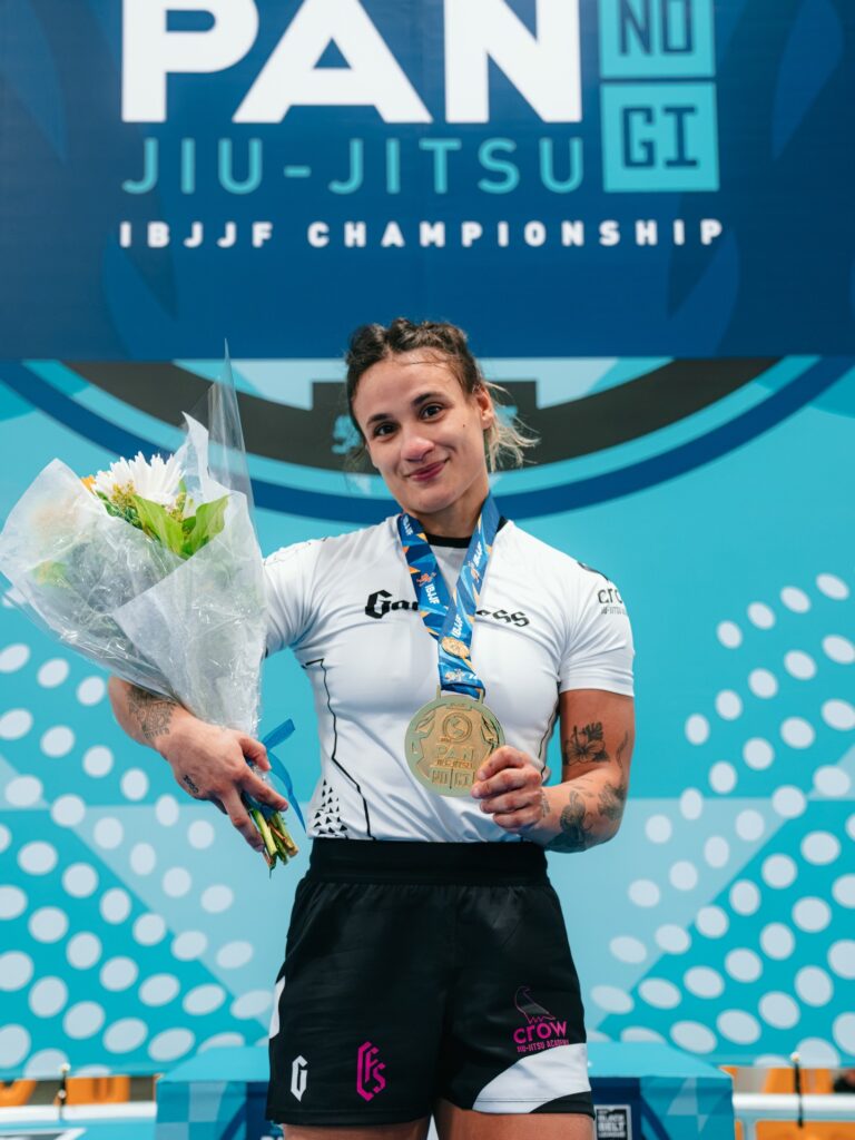 Sabrina Gondim joins The Crown and could get a rematch with Janaína Lebre 1 Sabrina Gondim with her gold medal on the podium at the 2026 IBJJF No-Gi Pan